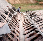 Joe Jenkins replacing a metal valley on a slate barn roof.